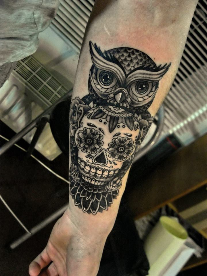 Black Ink Owl With Sugar Skull Tattoo On Forearm