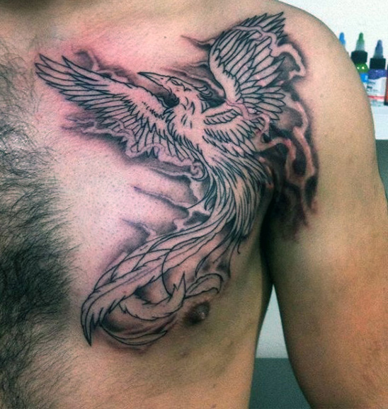 Black Ink Phoenix Tattoo On Man Left Chest