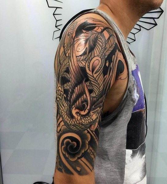 Black Ink Phoenix Tattoo On Man Right Half Sleeve