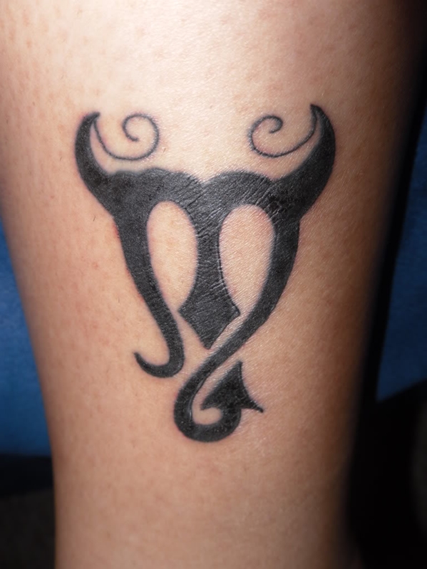 Black Ink Scorpio Zodiac Sign Tattoo On Forearm