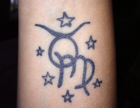 Black Ink Taurus Zodiac Sign With Stars Tattoo Design For Forearm