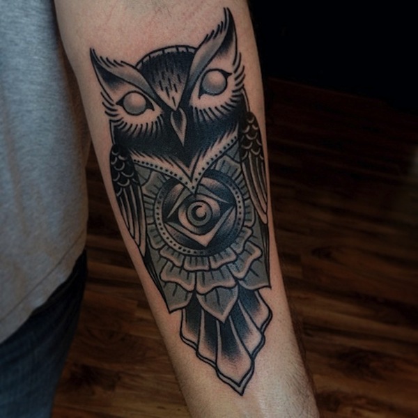 Black Ink Traditional Owl Tattoo On Left Forearm