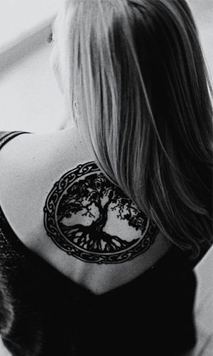 Black Ink Tree Of Life Tattoo On Girl Upper Back