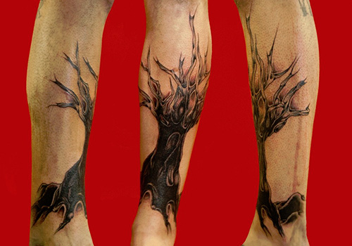 Black Ink Tree Of Life Tattoo On Leg