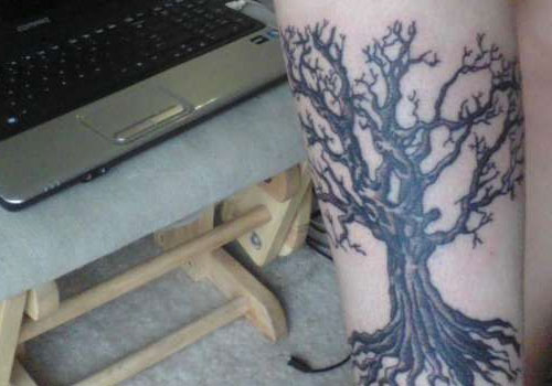 Black Ink Tree Of Life Tattoo On Right Forearm