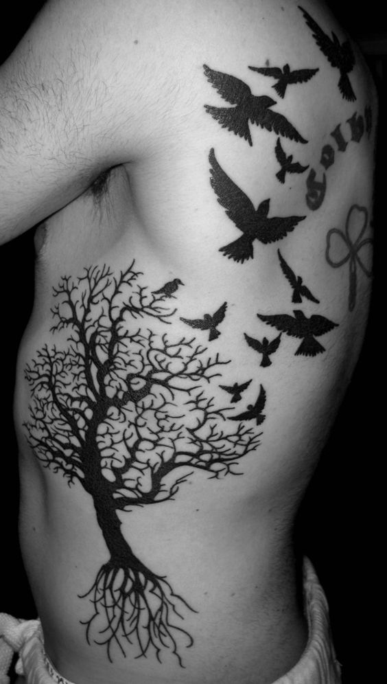 Black Ink Tree Of Life With Flying Birds Tattoo On Left Side Rib