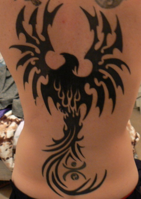 Black Ink Tribal Phoenix Tattoo On Full Back