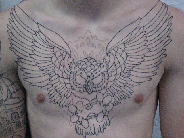 Black Outline Flying Owl With Hourglass Tattoo On Man Chest