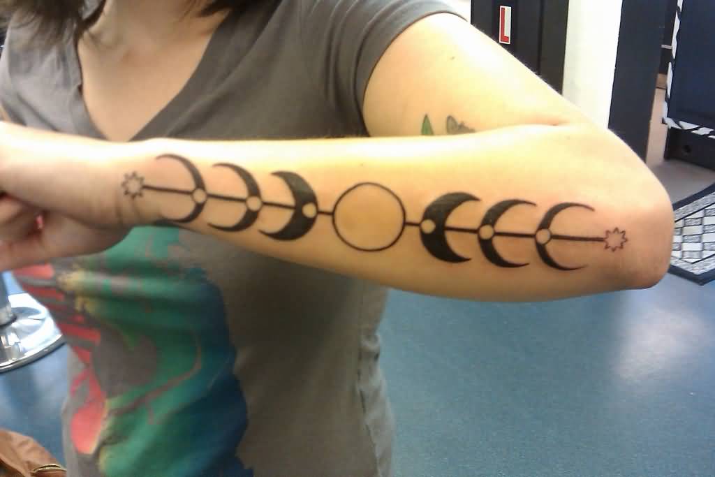 Black Phases Of The Moon Tattoo On Girl Left Arm