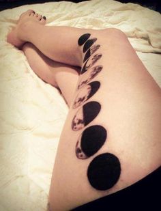 Black Phases Of The Moon Tattoo On Girl Left Thigh