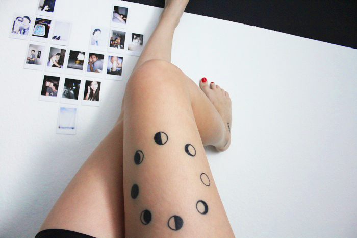 Black Phases Of The Moon Tattoo On Girl Right Thigh