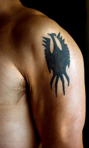 Black Phoenix Tattoo On Man Left Shoulder
