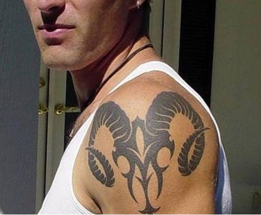 Black Tribal Aries Zodiac Sign Tattoo On Man Left Shoulder