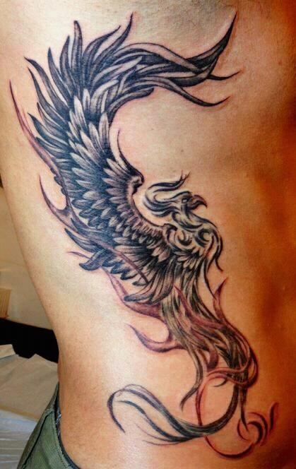 Black Tribal Flying Phoenix Tattoo On Right Side Rib