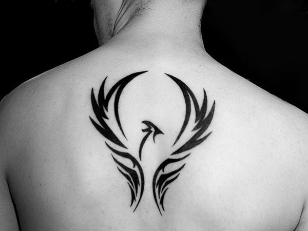 Black Tribal Phoenix Bird Tattoo On Upper Back