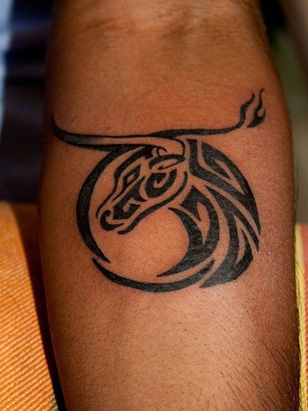 Black Tribal Taurus Zodiac Sign Tattoo On Forearm