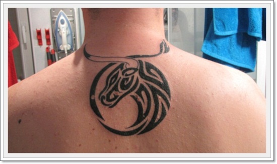 Black Tribal Taurus Zodiac Sign Tattoo On Upper Back