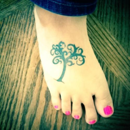 Black Tribal Tree Of Life Tattoo On Girl Right Foot
