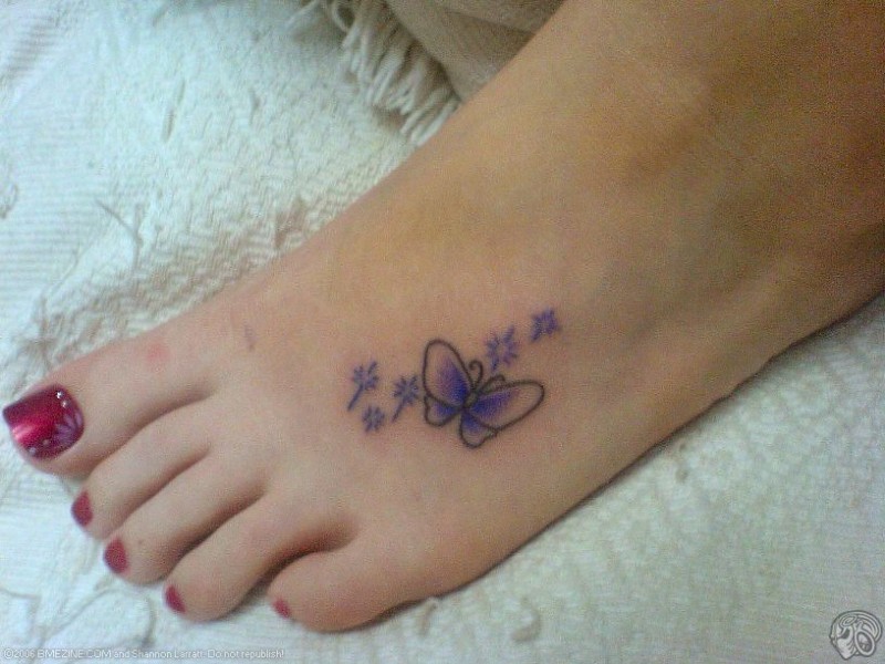 Blue Ink Butterfly Foot Tattoo For Girls