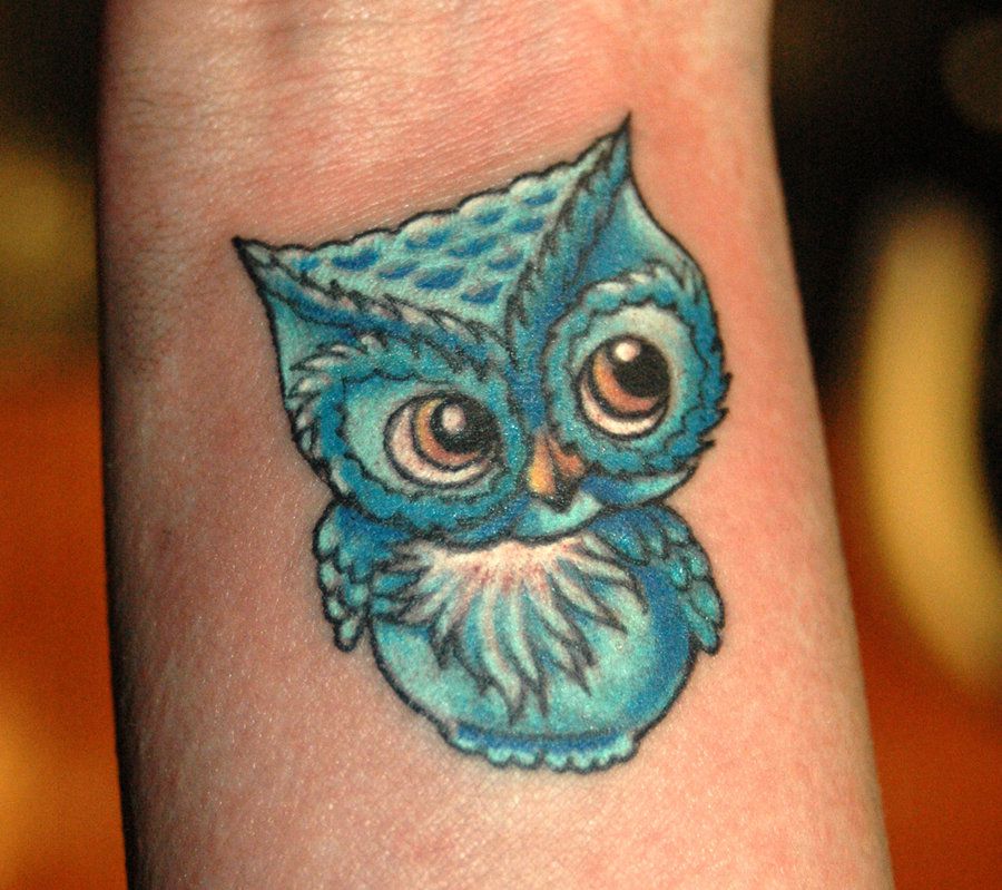 Blue Ink Small Owl Tattoo Design For Wrist