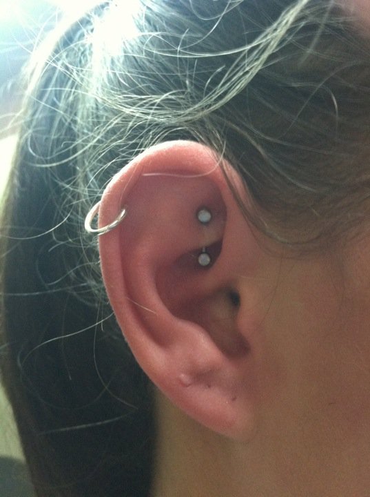 Cartilage And Rook Piercing On Girl Right Ear