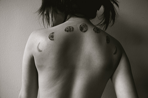 Classic Black And Grey Phases Of The Moon Tattoo On Girl Upper Back