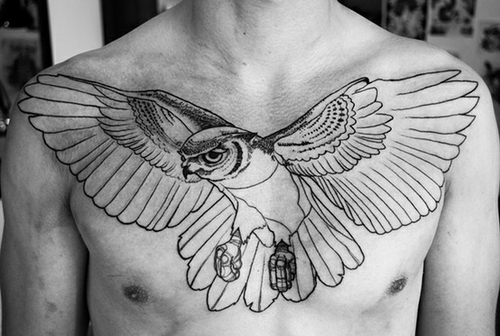 Classic Black Ink Flying Owl Tattoo On Man Chest