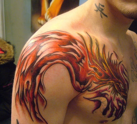 Classic Black Ink Phoenix Tattoo On Man Right Front Shoulder