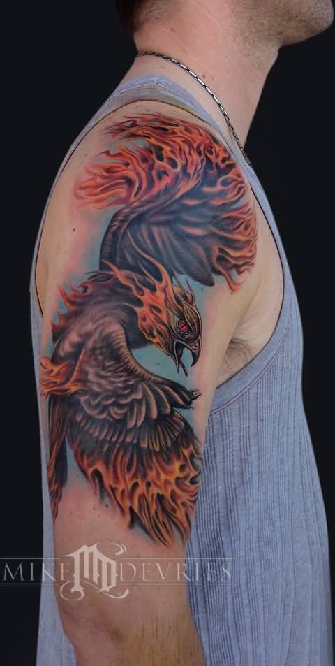 Classic Black Ink Phoenix Tattoo On Man Right Upper Arm