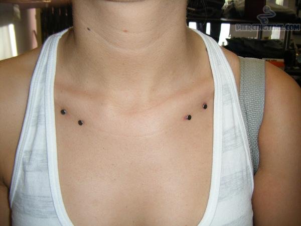Clavicle Piercing With Silver Dermals