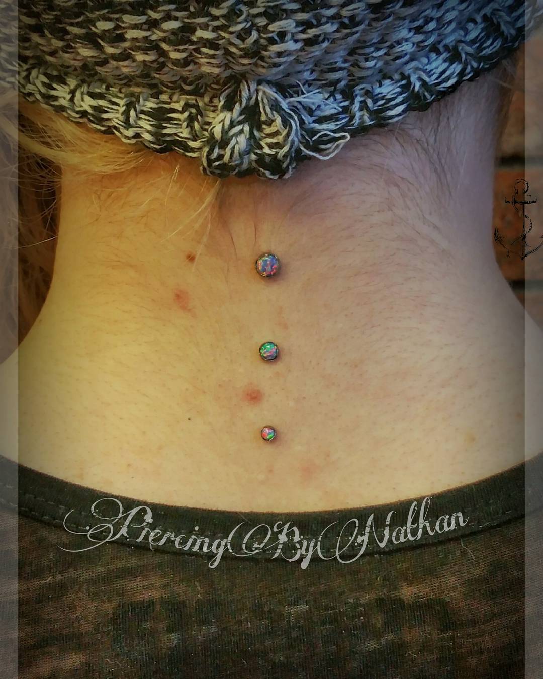 Colorful Anchors Piercing On Back Neck