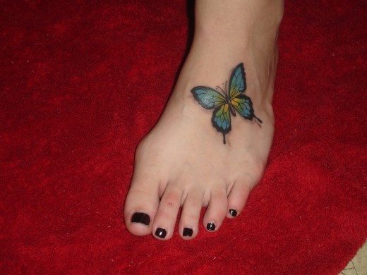 Colorful Butterfly Foot Tattoo Idea For Girls