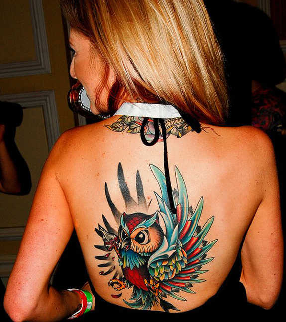 Colorful Flying Owl Bird Tattoo On Girl Back