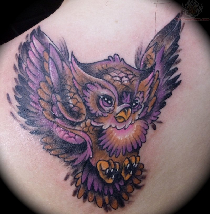 Colorful Flying Owl Tattoo On Man Upper Back