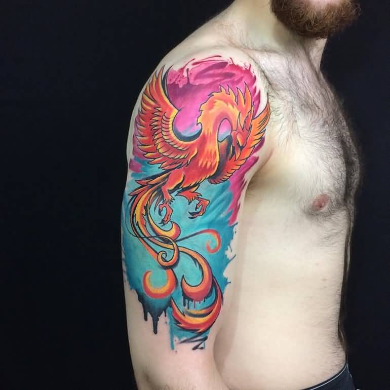 Colorful Flying Phoenix Tattoo On Man Right Upper Arm