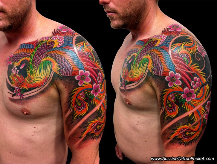 Colorful Japanese Phoenix With Flowers Tattoo On Man Left Half Sleeve