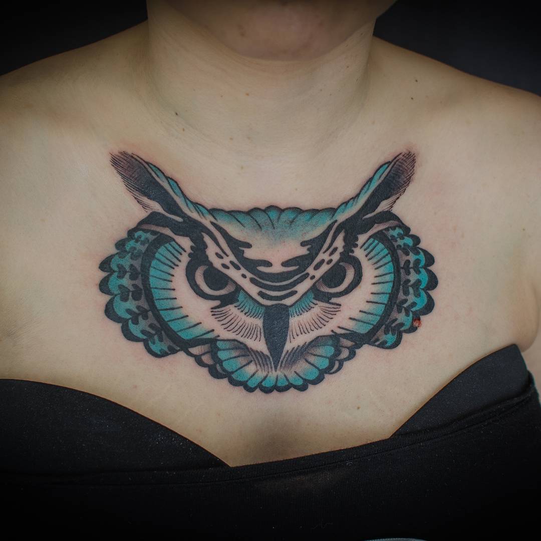 Colorful Owl Head Tattoo On Girl Collarbone