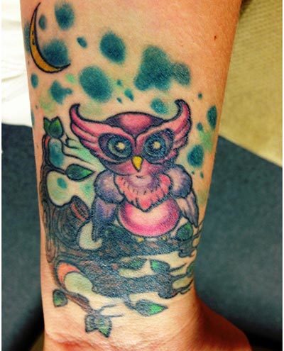 Colorful Owl On Branch Tattoo Design For Forearm