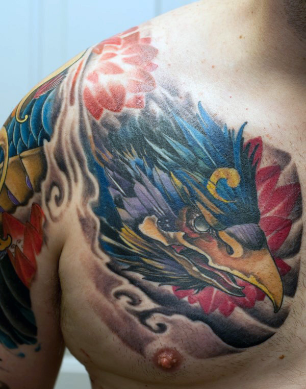Colorful Phoenix Head Tattoo On Man Right Chest