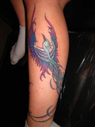 Colorful Phoenix Tattoo On Left Leg