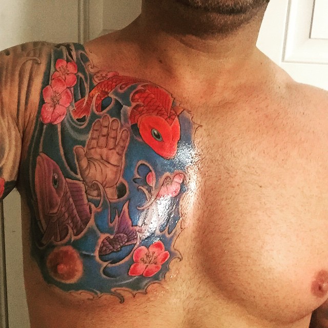 Colorful Pisces Zodiac Sign Tattoo On Man Right Chest