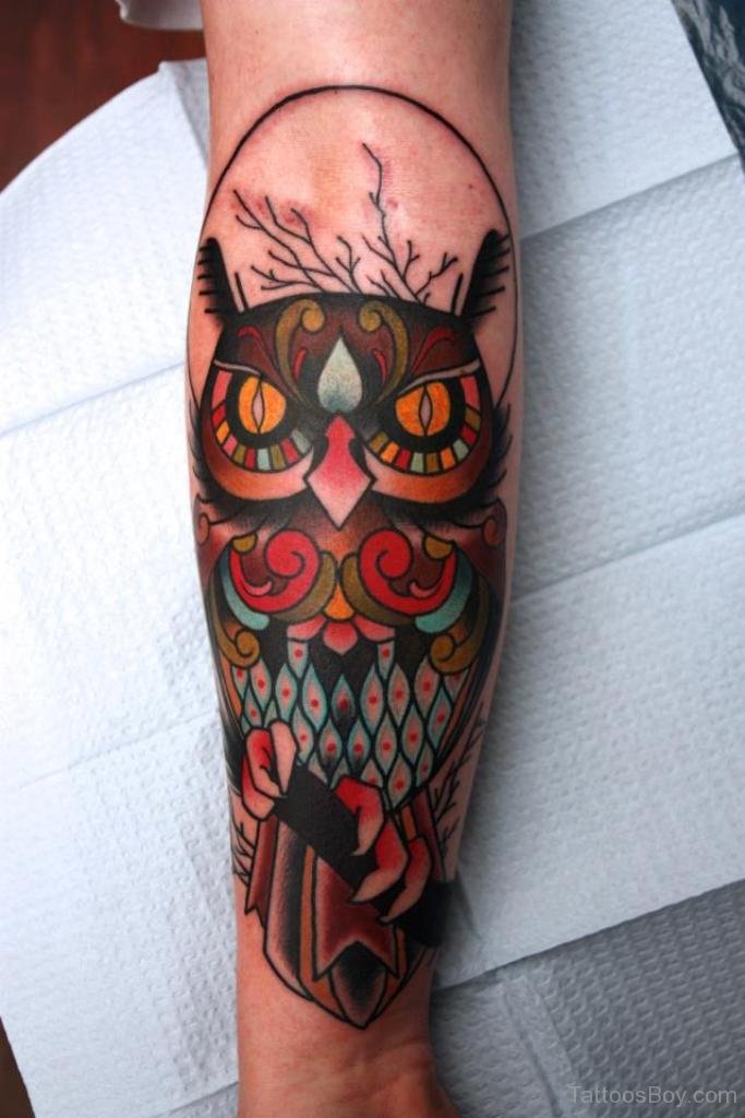 Colorful Traditional Owl Tattoo On Forearm