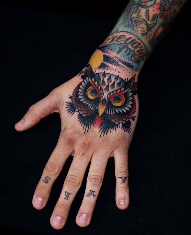 Colorful Traditional Owl Tattoo On Left Hand