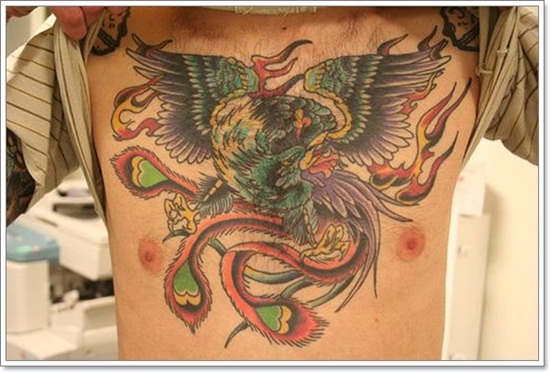 Colorful Traditional Phoenix Tattoo On Man Chest