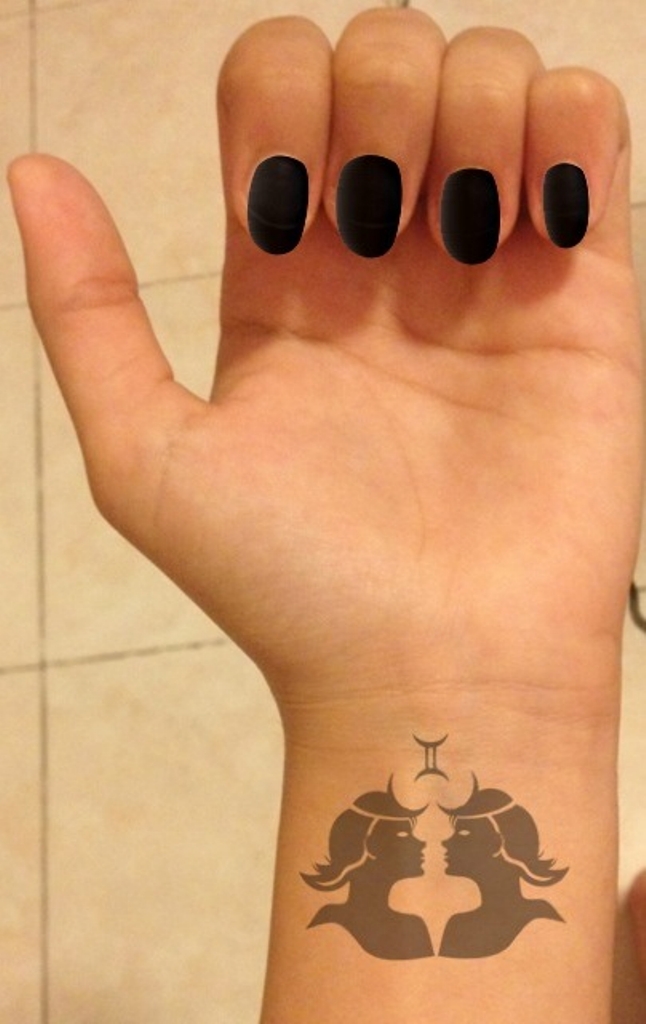 Cool Black Gemini Zodiac Sign Tattoo On Girl Left Wrist