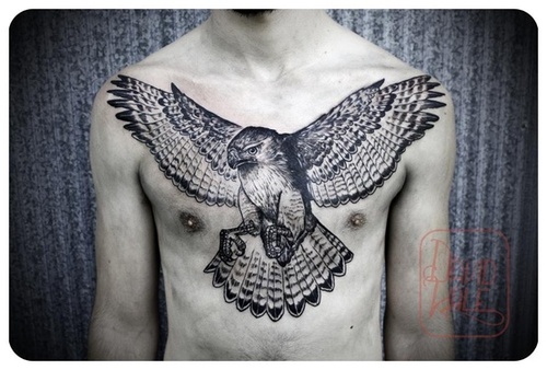 Cool Black Ink Flying Owl Tattoo On Man Chest