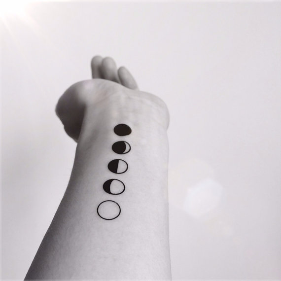 Cool Black Phases Of The Moon Tattoo On Left Forearm