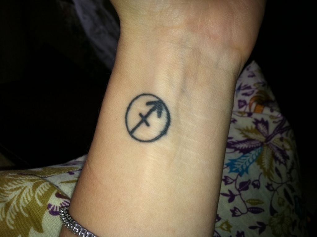Cool Black Sagittarius Zodiac Sign Tattoo On Wrist