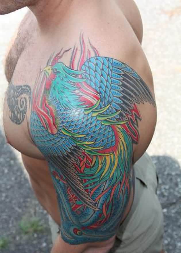 Cool Colorful Phoenix Tattoo On Man Left Half Sleeve