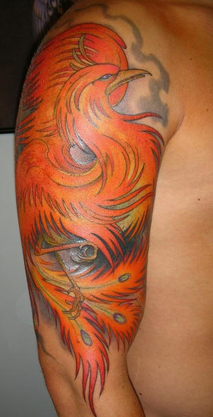 Cool Flying Phoenix Tattoo On Man Right Upper Arm